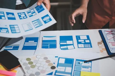 UI designer and UX developer brainstorm idea to design the application appe.. Stock Photos