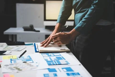 UI designer and UX developer brainstorm idea to design the application appe.. Stock Photos