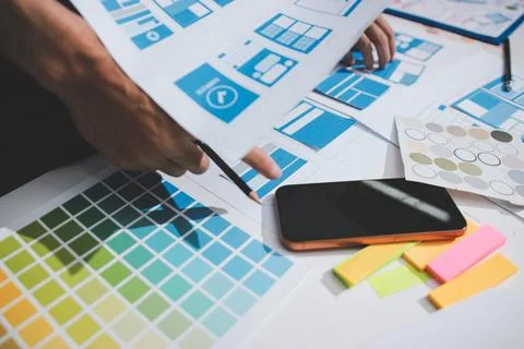 UI designer and UX developer brainstorm idea to design the application appe.. Stock Photos
