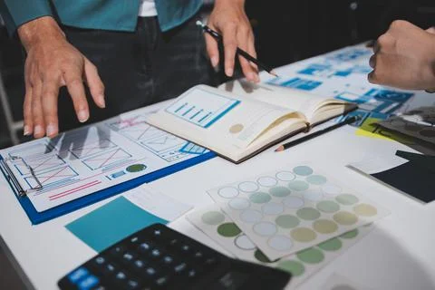 UI designer and UX developer brainstorm idea to design the application appe.. Stock Photos