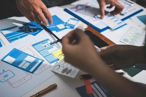 UI designer and UX developer brainstorm idea to design the application appe.. 写真素材