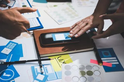 UI designer and UX developer brainstorm idea to design the application appe.. 写真素材