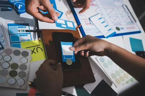 UI designer and UX developer brainstorm idea to design the application appe.. Stock Photos