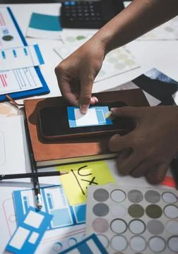 UI designer and UX developer brainstorm idea to design the application appe.. Stock Photos