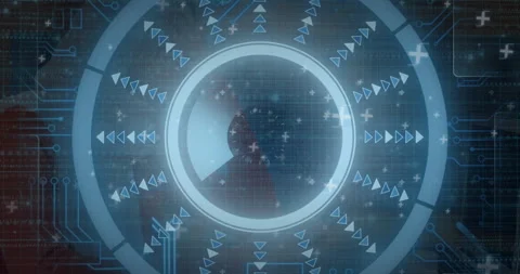 UI designer interacting with tech HUD interface, displaying segmented ring arcs Stock Footage 307449600