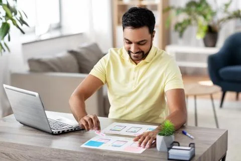 Ui designer working on user interface at home 스톡 사진