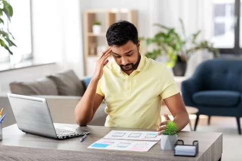 Ui designer working on user interface at home Stock Photos
