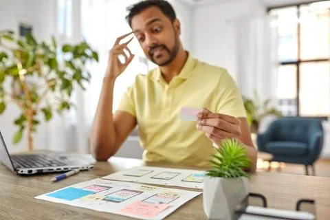 Ui designer working on user interface at home 스톡 사진