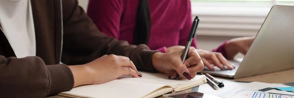 UI Designers Collaborate on Interface Design and Write Notes for Mobile App.. Stock Photos