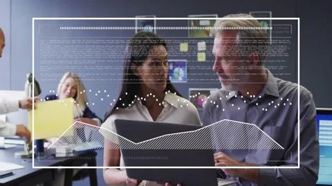 UI overlay appearing as pair reviewing laptop, team passing folders, graphs Stock Footage 334115444