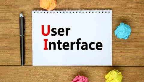 UI user interface symbol. Concept words UI user interface on white note. Meta Stock-Fotos