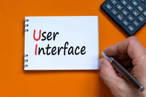 UI user interface symbol. Concept words UI user interface on white note. Busi Foto stock