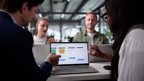 UI UX Designer Team Developing Mobile Shopping Stock Footage 312121972