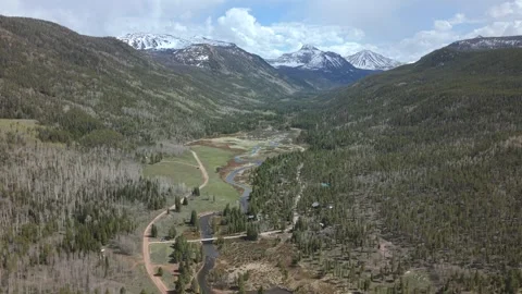 Uinta Mountains Christmas Meadows Drone Flyover Above River Video stock 335601264