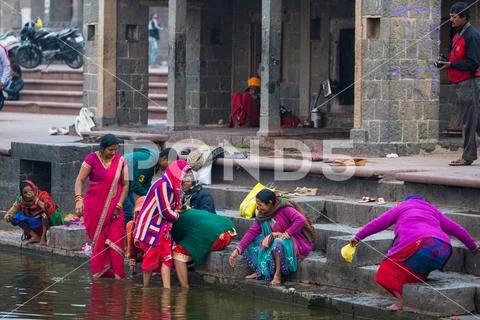 Ujjain, India - December 7, 2017: People attending religious ceremony on hol Stock Photos
