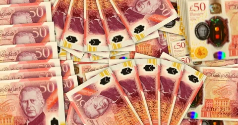 UK 50 pound sterling banknotes in a fan mosaic pattern loop Stock Footage 345037694