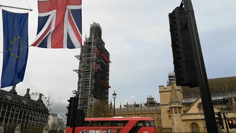 UK and EU flags hung in front of Big Ben in constructions, London 2018 Video stock 89679797
