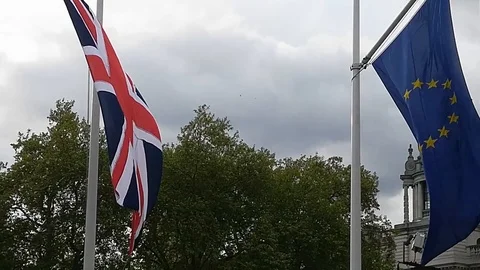 UK and EU flags hung in Parliament Square in London 2018 Stock Footage 89680010