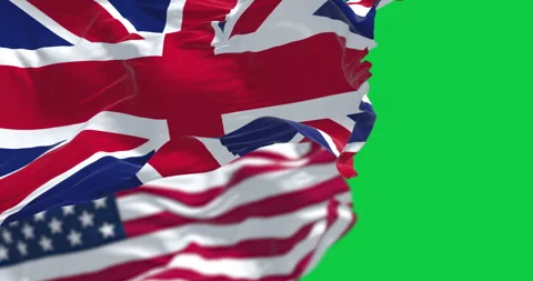 UK and US national flags waving in the wind isolated on green background Stock Footage 344961930