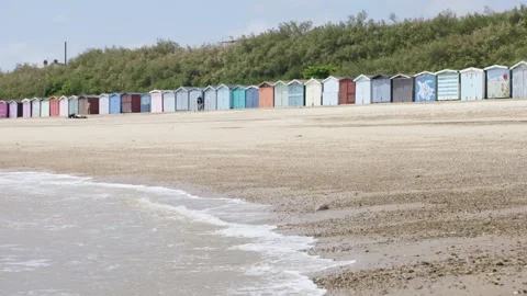 UK Beach with beach huts Stock Footage 247456412