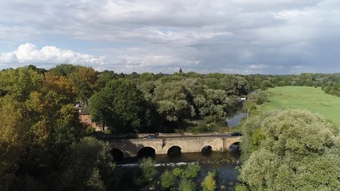 UK Countryside Using  Drone Rising Up Showing Bridge And River Video stock 92844046