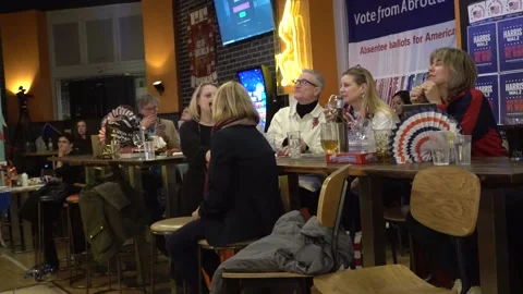 UK: Democrats in London react to the swing state of North Carolina being ... Video stock 290891728