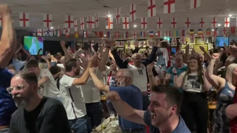 UK: Fans react to Euro 2024 final at Stourbridge FC’s Glassboys Bar Video stock 280449627