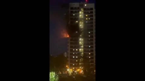 UK: Fire Breaks Out At High-Rise Flat In North Woolwich 2 Stock Footage 280492838