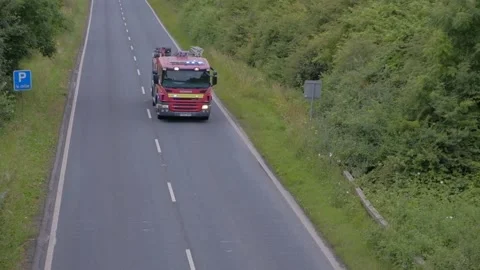 UK fire engine, emergency, flashing lights, countryside road. York.UK 6.7.2024 Video stock 279249927
