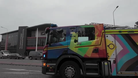 UK fire engine responding to an emergency, pride flag. Hull.UK. 6.7.2025 Stock Footage 319473146
