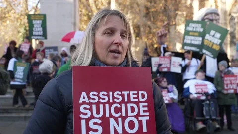 UK: Interviews with protestors as assisted dying bill is discussed in Par... Stock Footage 293856368