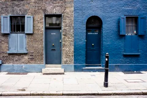 UK, London, Whitechapel, entrances and windows of two houses Stock Photos