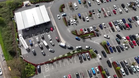 UK: Long queues at Costco in Coventry as fuel prices at the pumps soar Stock Footage 332484705