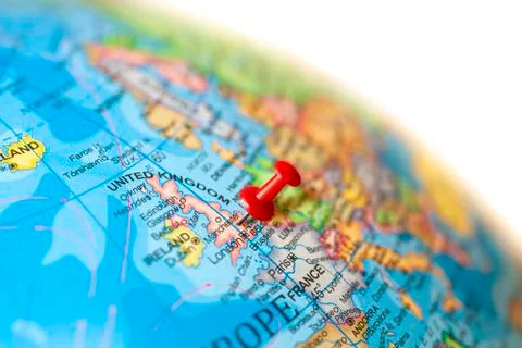 UK map. Earth globe close up with a red pin in United Kingdom. Stock Photos