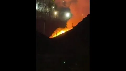 UK: Massive fire engulfs industrial site in Bolton, England, UK Stock Footage 330838668
