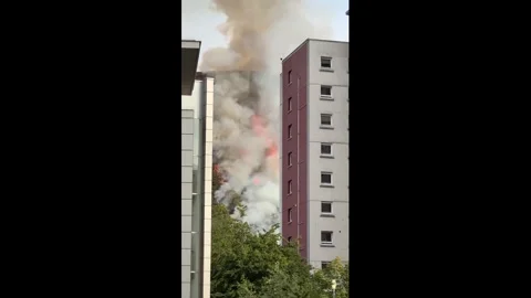 UK: Massive hillside fire sends thick smoke over Edinburgh, UK Stock Footage 340200802