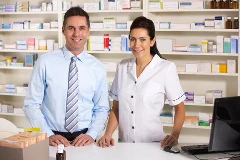 UK nurse and pharmacist working in pharmacy Stock Photos