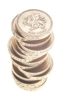 UK Pound coin currency stack on white background. Foto stock