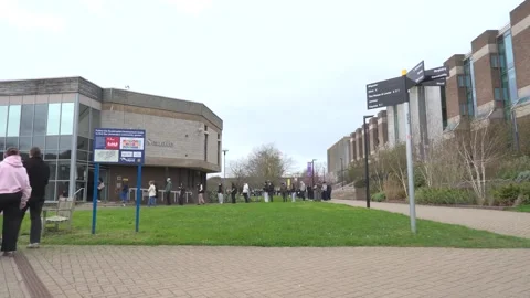 UK: Students queue for antibiotics at the University of Kent in Canterbur... Stock Footage 330871509