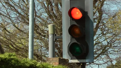 UK traffic lights red, amber, green. Filmed  London.UK. 20.07.2023 Stock Footage 257204110