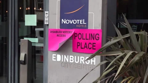 UK: Voters continue casting ballots across polling stations in Edinburgh ... Stock Footage 334327902