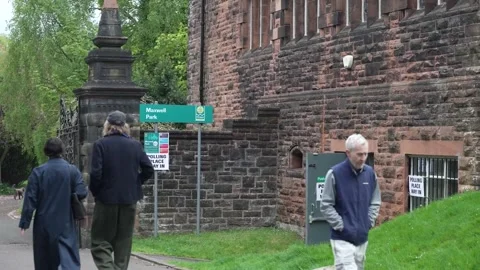 UK: Voters head for polling stations in Glasgow for Scottish elections Stock Footage 334311493
