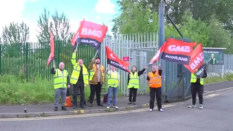 UK: Workers at BAE Systems shipyard in Govan walk out as union warns of d... Stock Footage 336562295