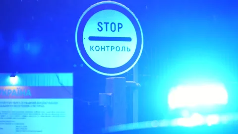 Ukraine Border Control Stop Sign at Night with Police Lights Stock Footage 314270767