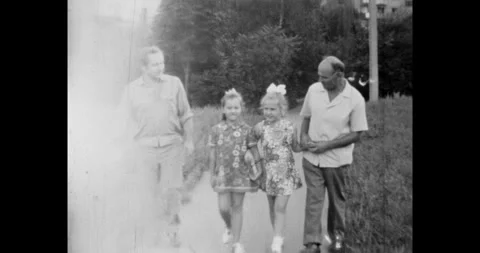 Ukraine - circa 1970s: Multi-generational family walking together Stock Footage 337464038