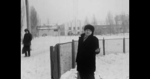 Ukraine - circa 1970s: soviet everyday life in winter, man gesturing to camera Stock-Footage 337157616