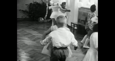 Ukraine - circa 1970s: Soviet kindergarten children dancing in pairs Stock Footage 325802017