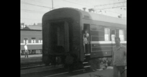 Ukraine - circa 1970s: Soviet passenger train arriving at the railway station 库存影片 337159858