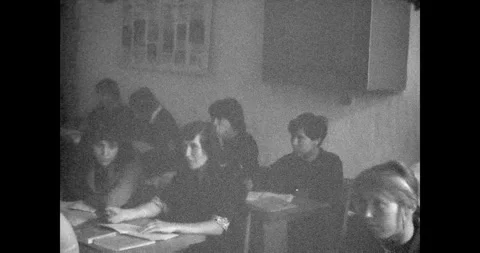 Ukraine - circa 1970s: Soviet school students sitting at desks in classroom Video stock 333586579