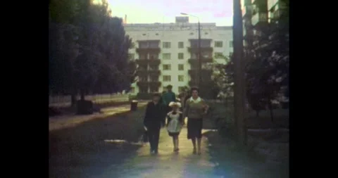 Ukraine - circa 1980s: Back-to-School Morning, Mother and Children Video stock 323649091